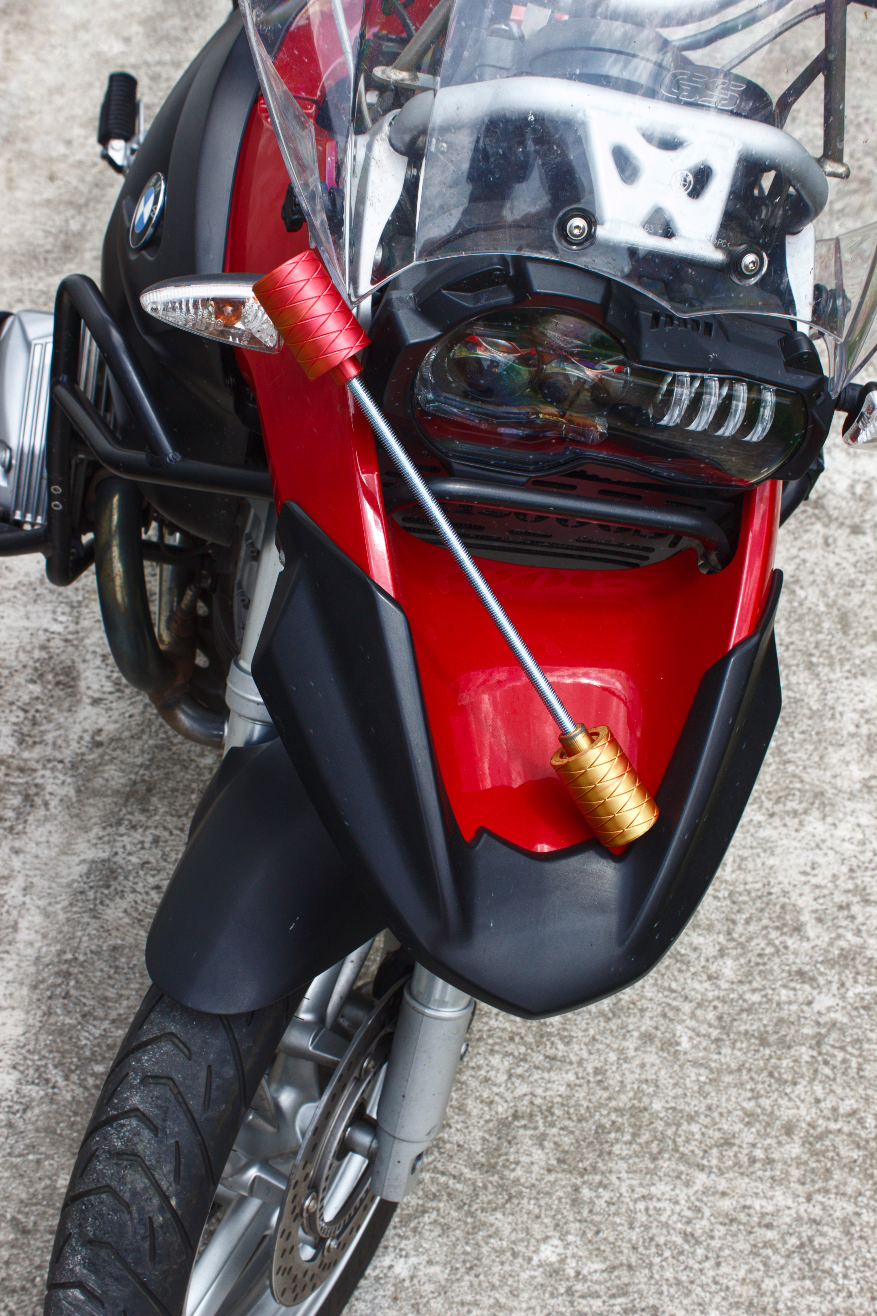 Shark Moto axle slider close-up on wheel